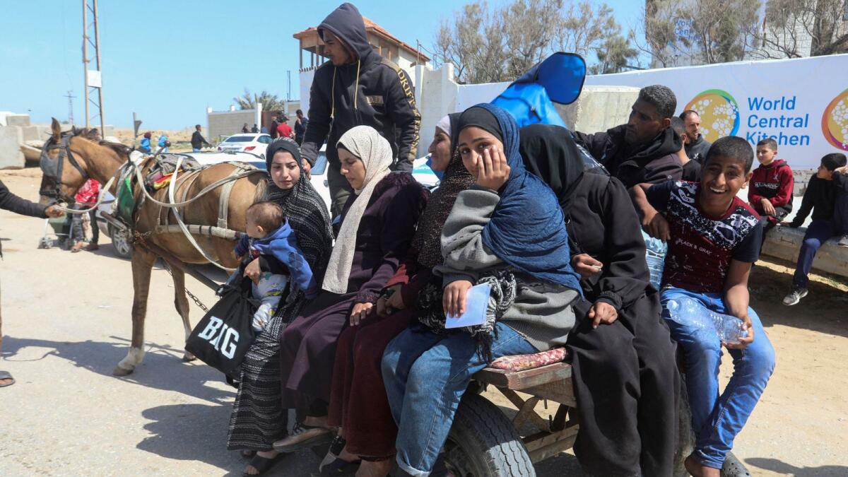 Palestinians fleeing north Gaza after Israeli troops raided Al Shifa hospital in the central Gaza Strip. — Reuters