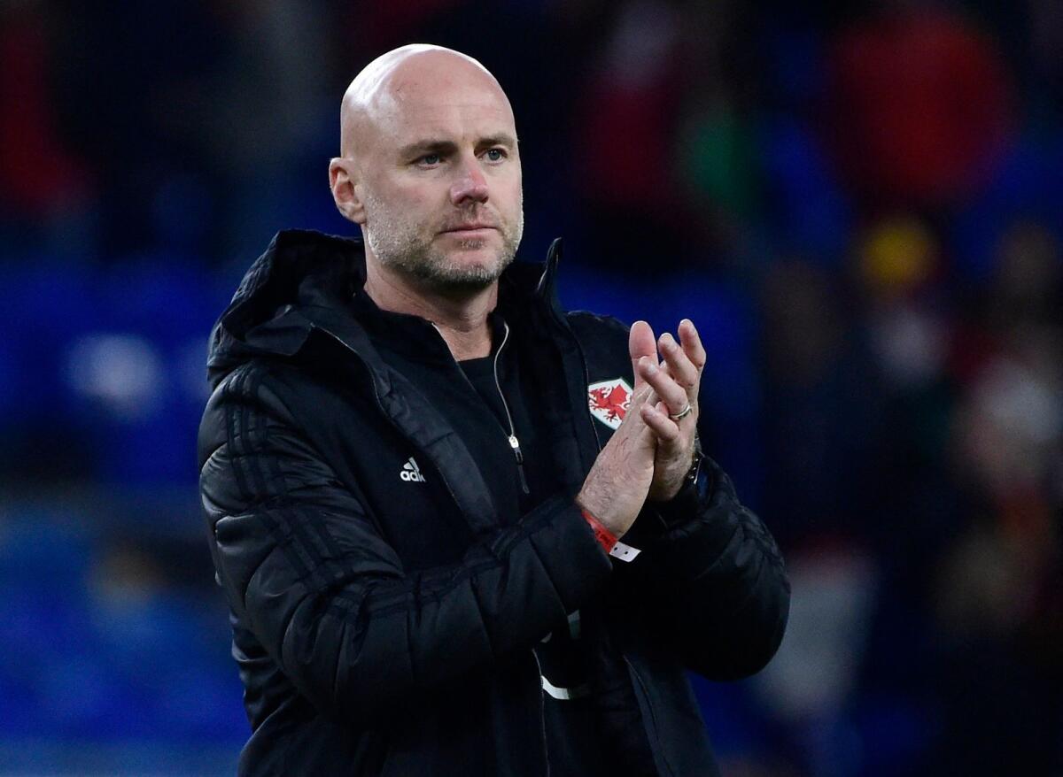 Wales manager Rob Page applauds the fans after the match against Poland. (Reuters)