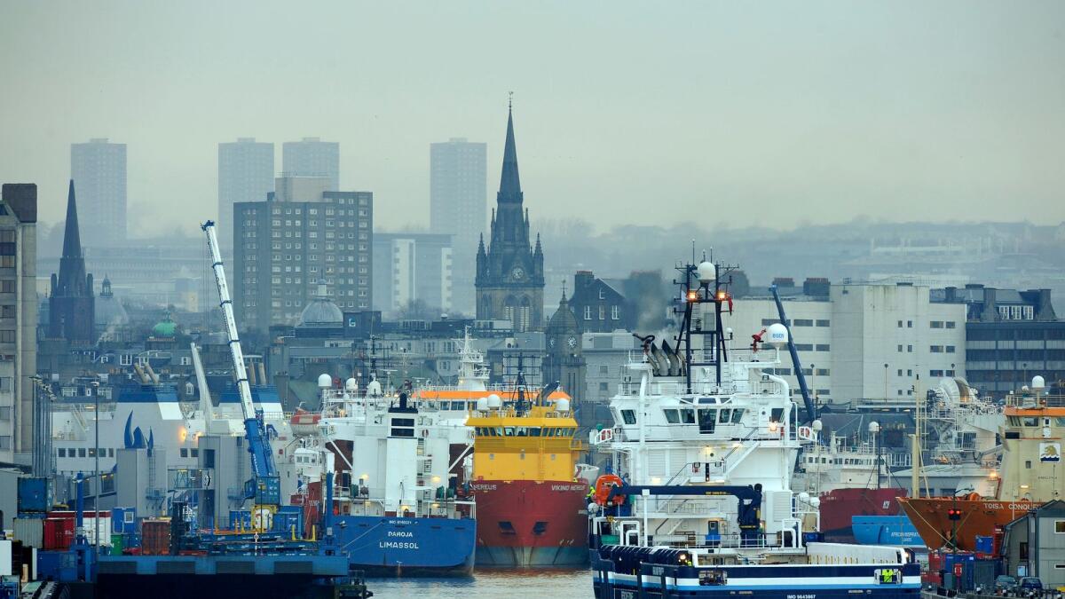 Ships are seen in Aberdeen Harbour, the busiest port for the oil industry in the UK, in Aberdeen, Scotland. — AFP file photo
