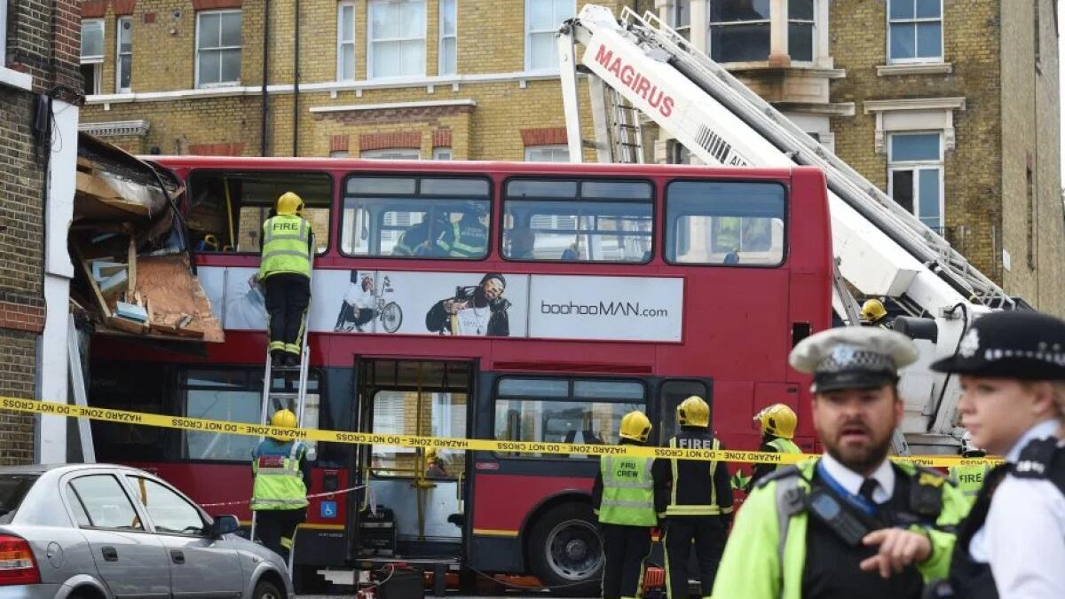 London bus smashes into shop, many injured