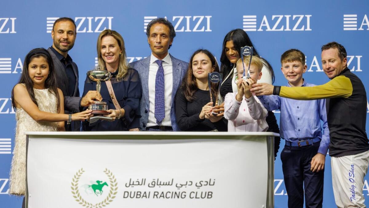 Tadhg O'Shea and trainer Bhupat Seemar celebrate winning the Dubawi Stakes., - Photo Dubai Racing Club