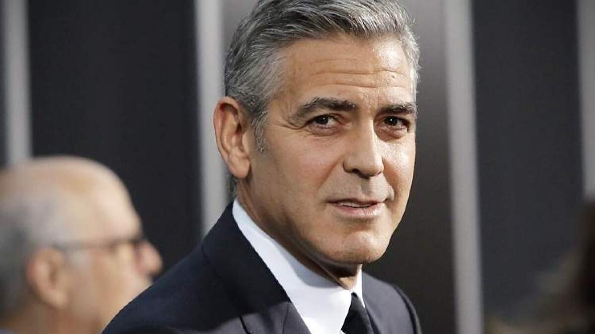 George Clooney hit by car while riding motorcycle 