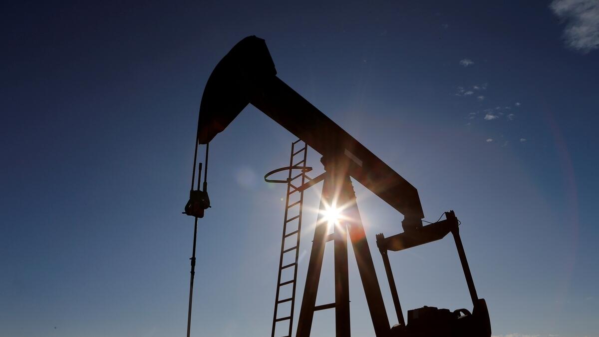 Crude gained further support, and the US dollar weakened, after the Federal Reserve Chair opened the door to a slowdown in the pace of rate hikes.  - File photo