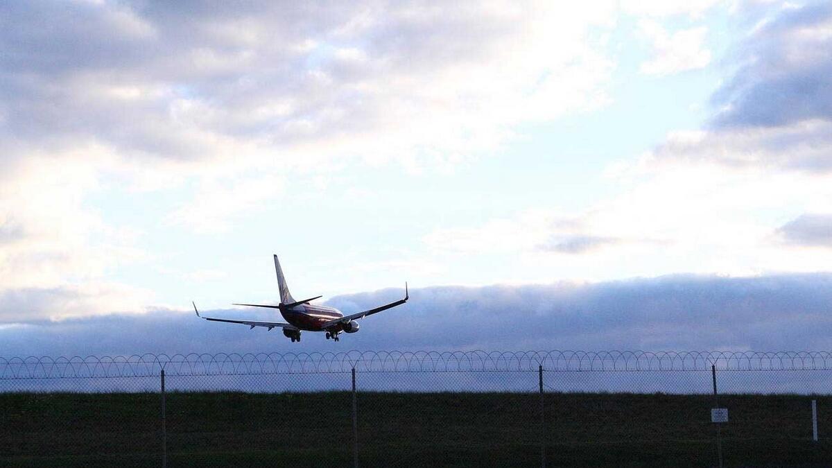Plane skids off runway on landing due to heavy rain