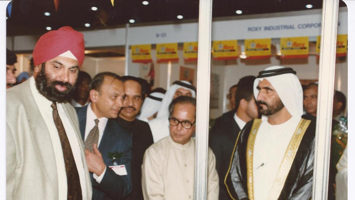 His Highness Shaikh Mohammed bin Rashid Al Maktoum, Vice-President and Prime Minister of the UAE and Ruler of Dubai, with Surender Singh Kandhari during a Jebel Ali trade show in 2005.