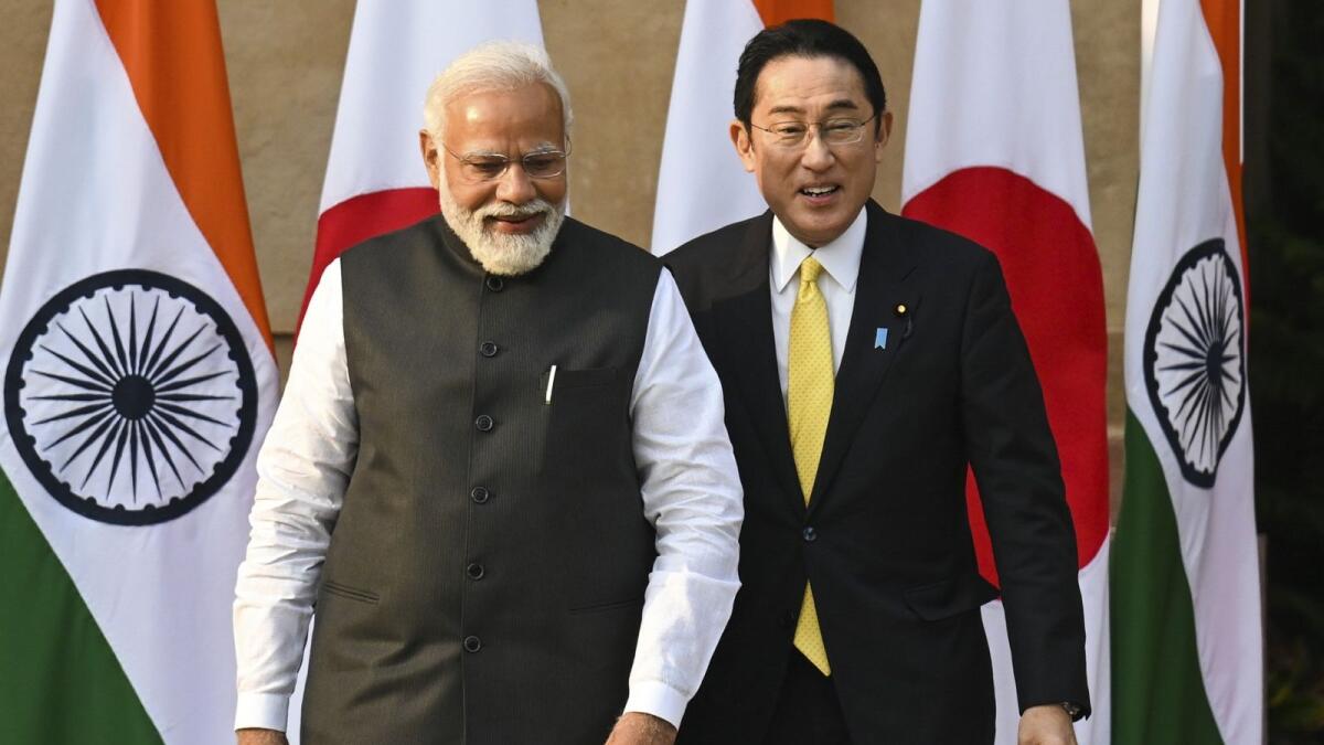 Japan's Prime Minister Fumio Kishida and his Indian counterpart Narendra Modi at the lawns of the Hyderabad House in New Delhi. AFP