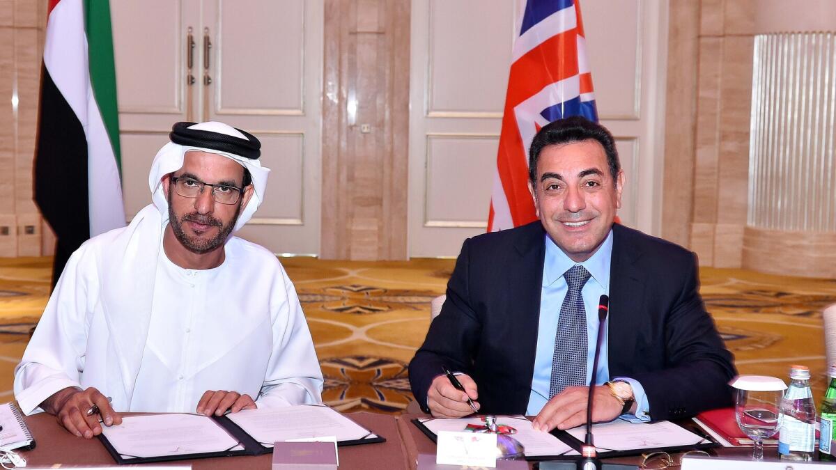 Nasser A. Alsowaidi and samir Brikho signing new terms of reference for the Business council. — Supplied photo