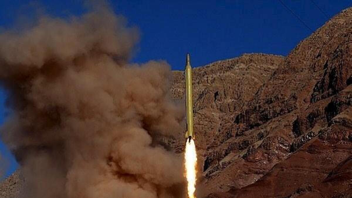 Iran to carry on missile programme, condemns US sanctions 
