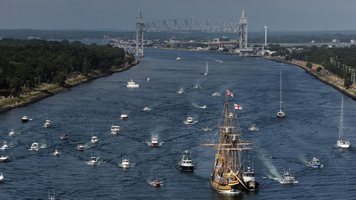The Mayflower II makes its way through the Cape Cod Canal on its way to its homeport in Plymouth, Mass. The replica of the original Mayflower ship that brought the Pilgrims to America 400 year ago this year is setting out on the final leg of its journey home following extensive renovations. Photo: AP