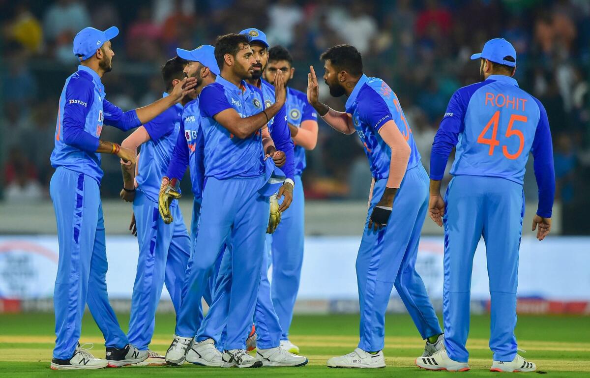 India's Bhuvneshwar Kumar celebrates with teammates after taking the wicket of Australian batter Cameron Green. (PTI)