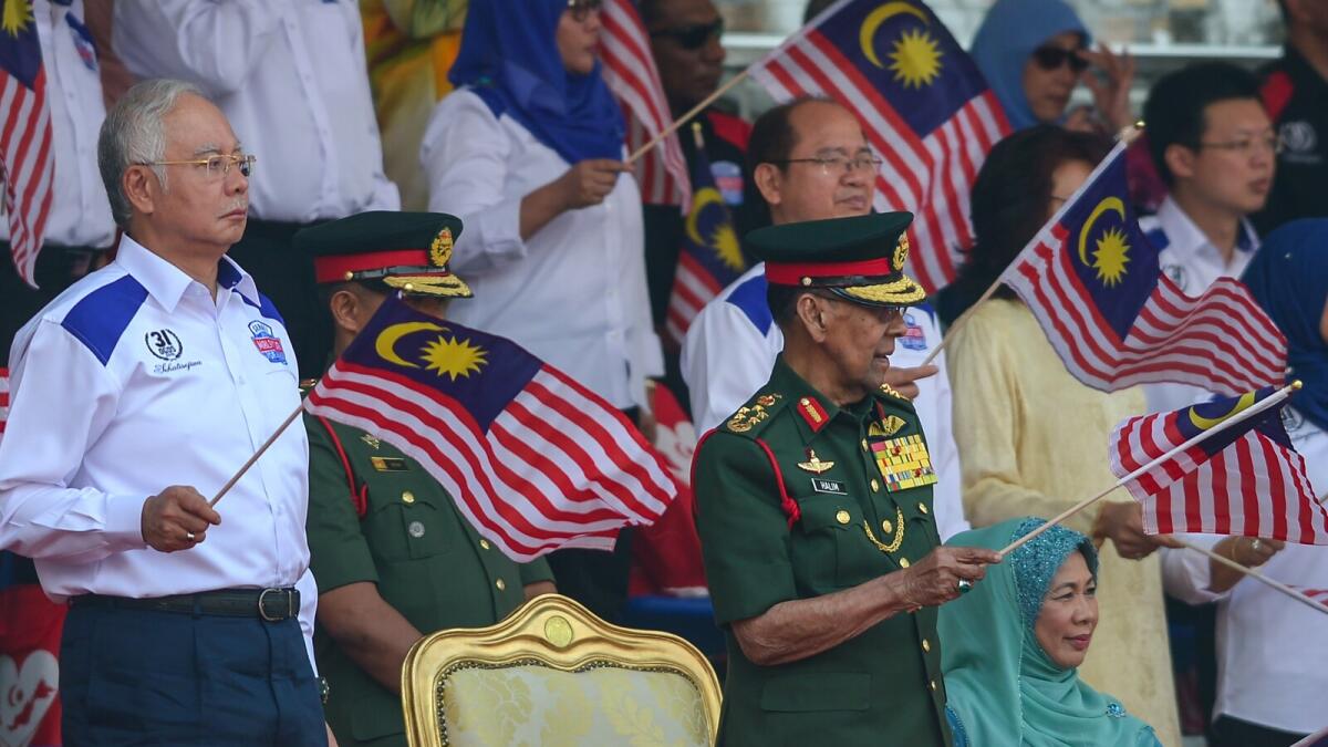 Razak vows not to quit as Malaysia marks National Day