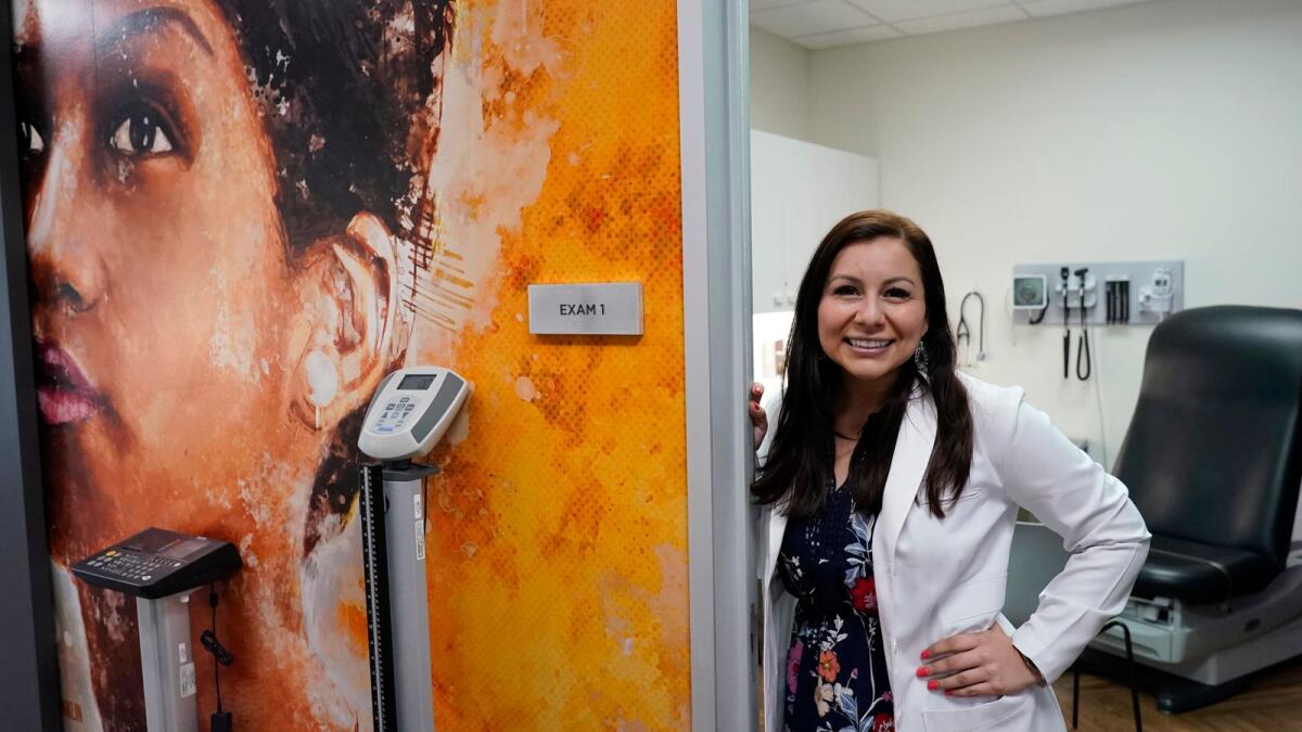 Brenda Olmos, a nurse practitioner who focuses on the geriatric population and Hispanic patients poses for a photo on March 9, 2021, in Austin, Texas.