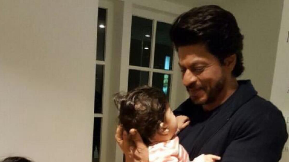 Cute photo of the day: Shah Rukh Khan cuddles a little baby