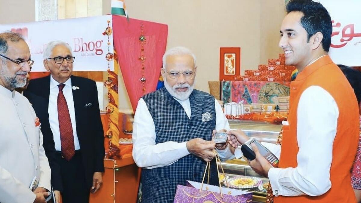 RuPay, UAE, India, Modi, Modi in UAE, Modi buys laddoo