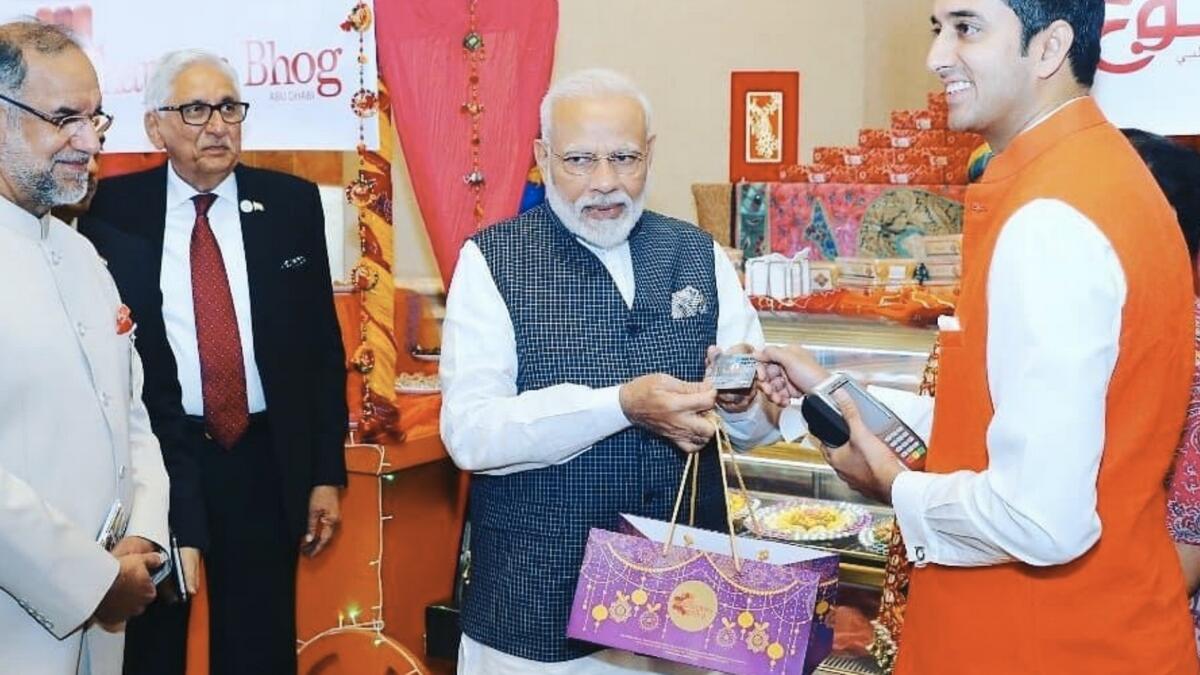 RuPay, UAE, India, Modi, Modi in UAE, Modi buys laddoo