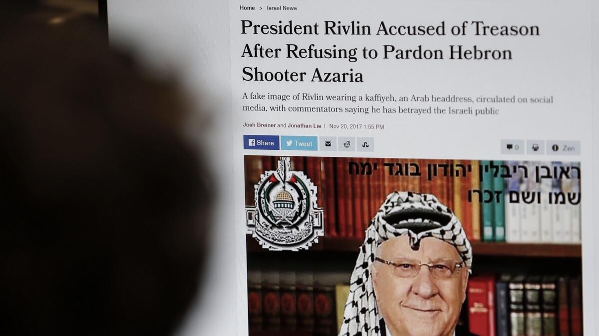 Israel probes presidents photo in Palestinian scarf