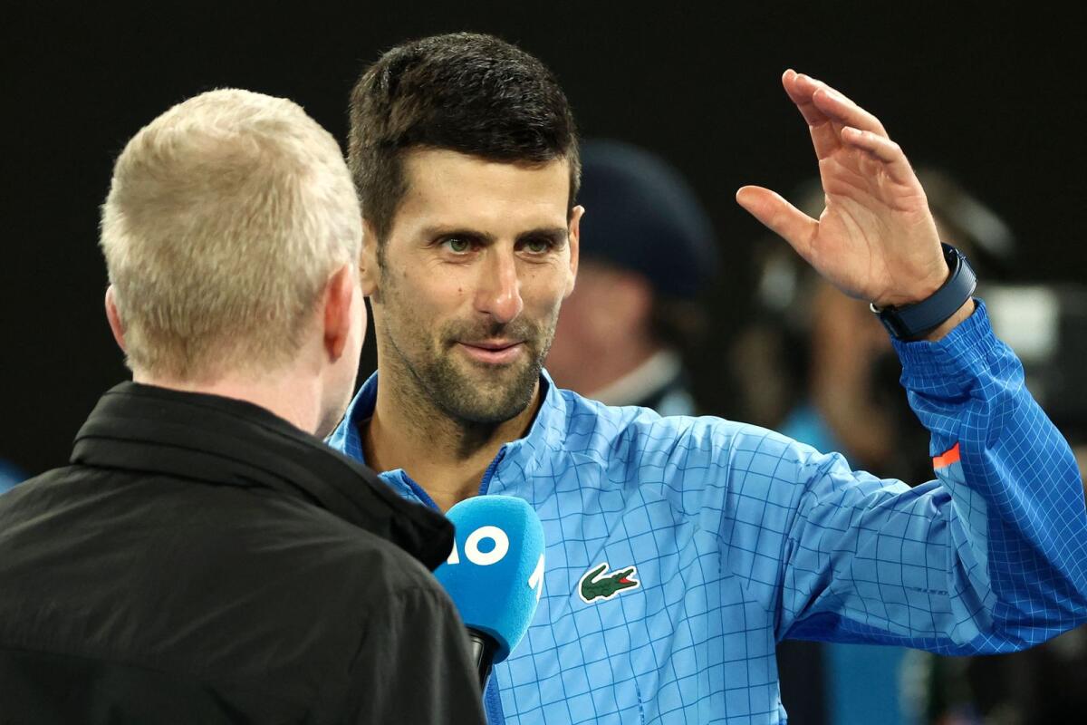 Novak Djokovic during the on-court interview after his win over Andrey Rublev. — AFP