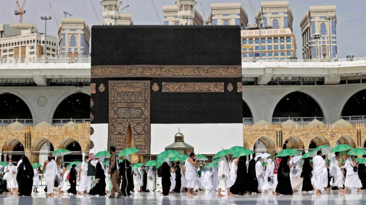 Pilgrims arrive at the Kaaba at the Grand mosque in the holy city of Makkah, at the start of the Haj season on Saturday. — AFP