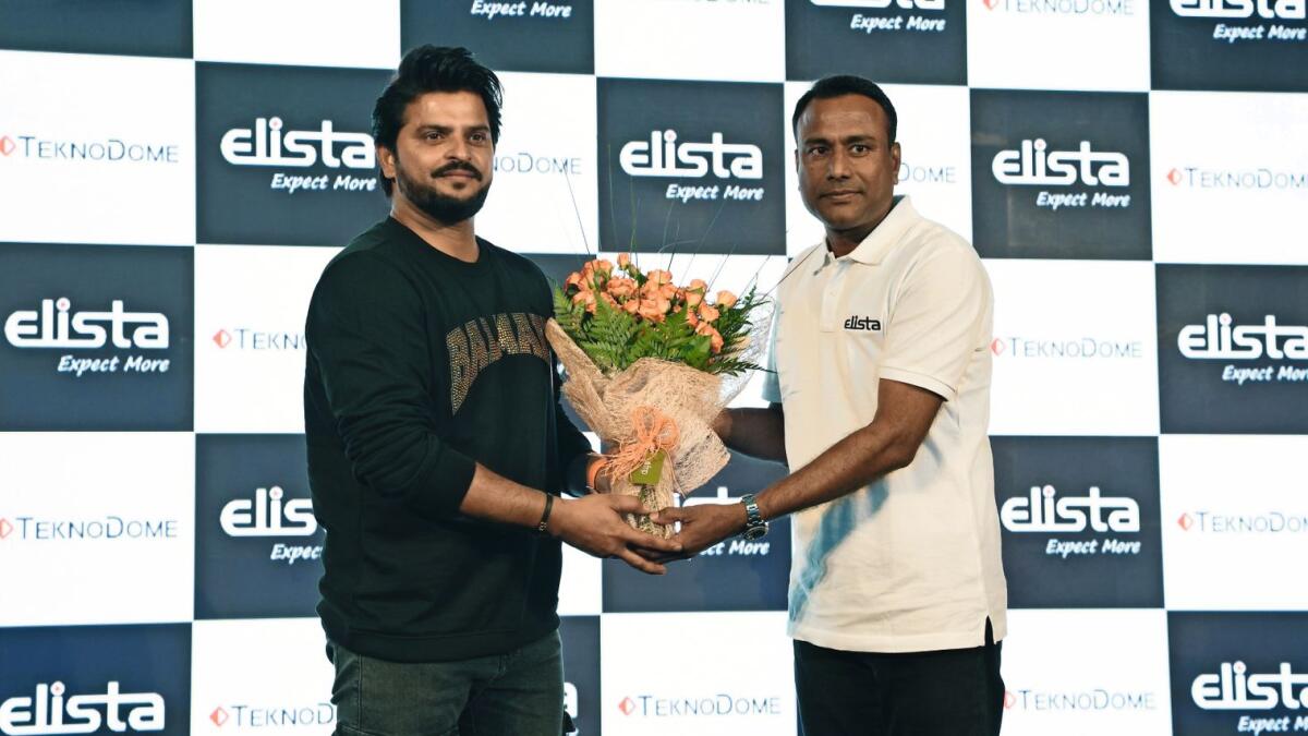 Suresh Raina, cricketer, being felicitated bySaket Gaurav,Chairman and Managing Director at Teknodome FZE.