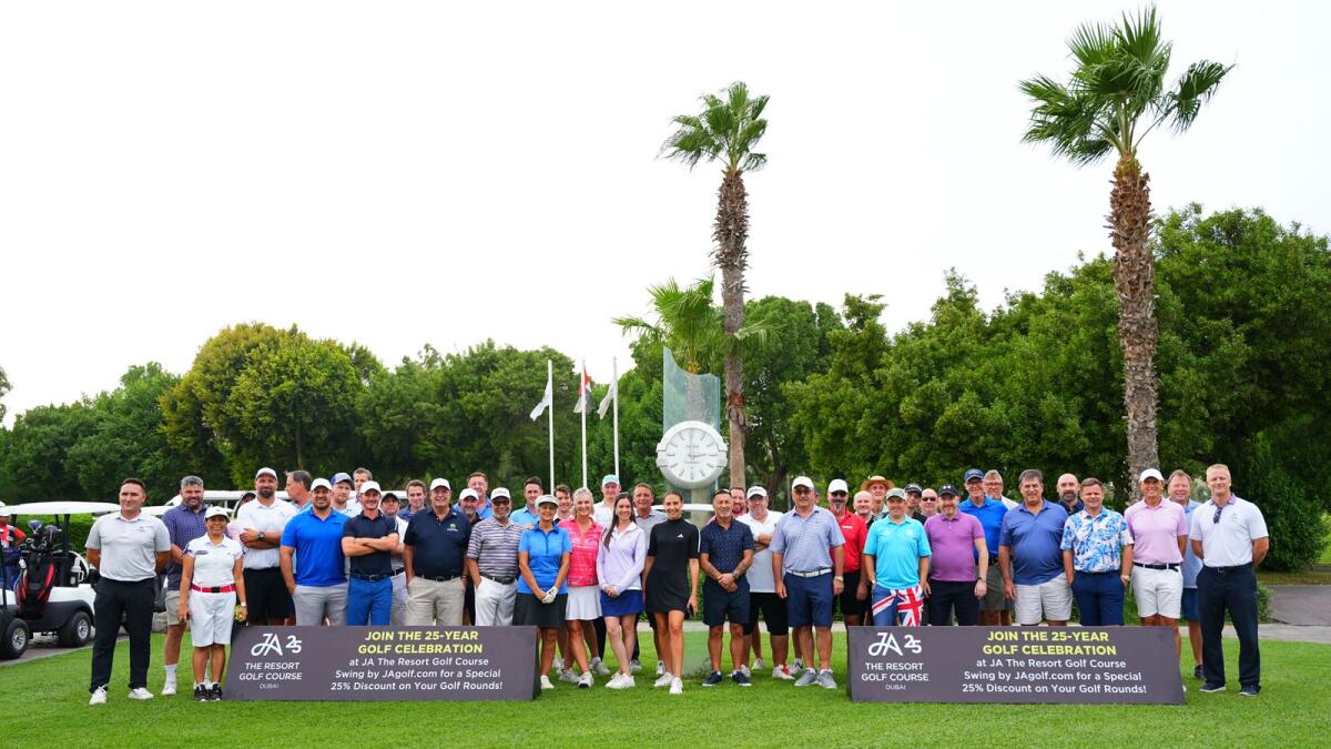 Players and officials prior to teeing off in the JA The Resort 25th Anniversary Golf Day. - Supplied photo..
