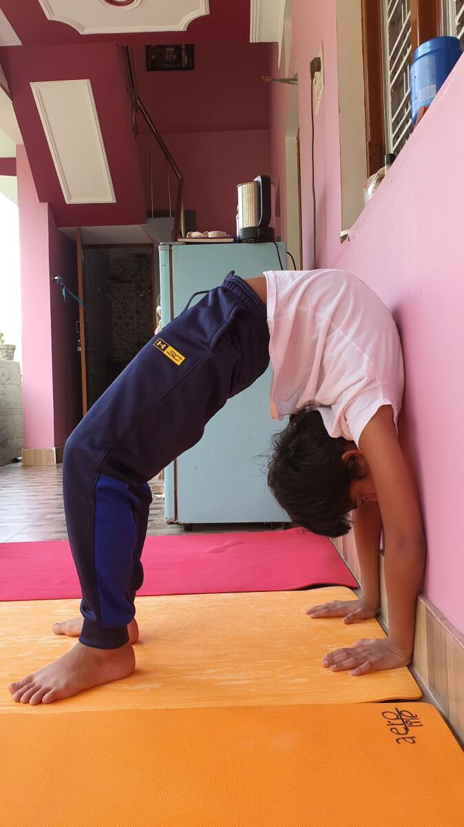 Reyansh Surani practising yoga. Photo: Supplied