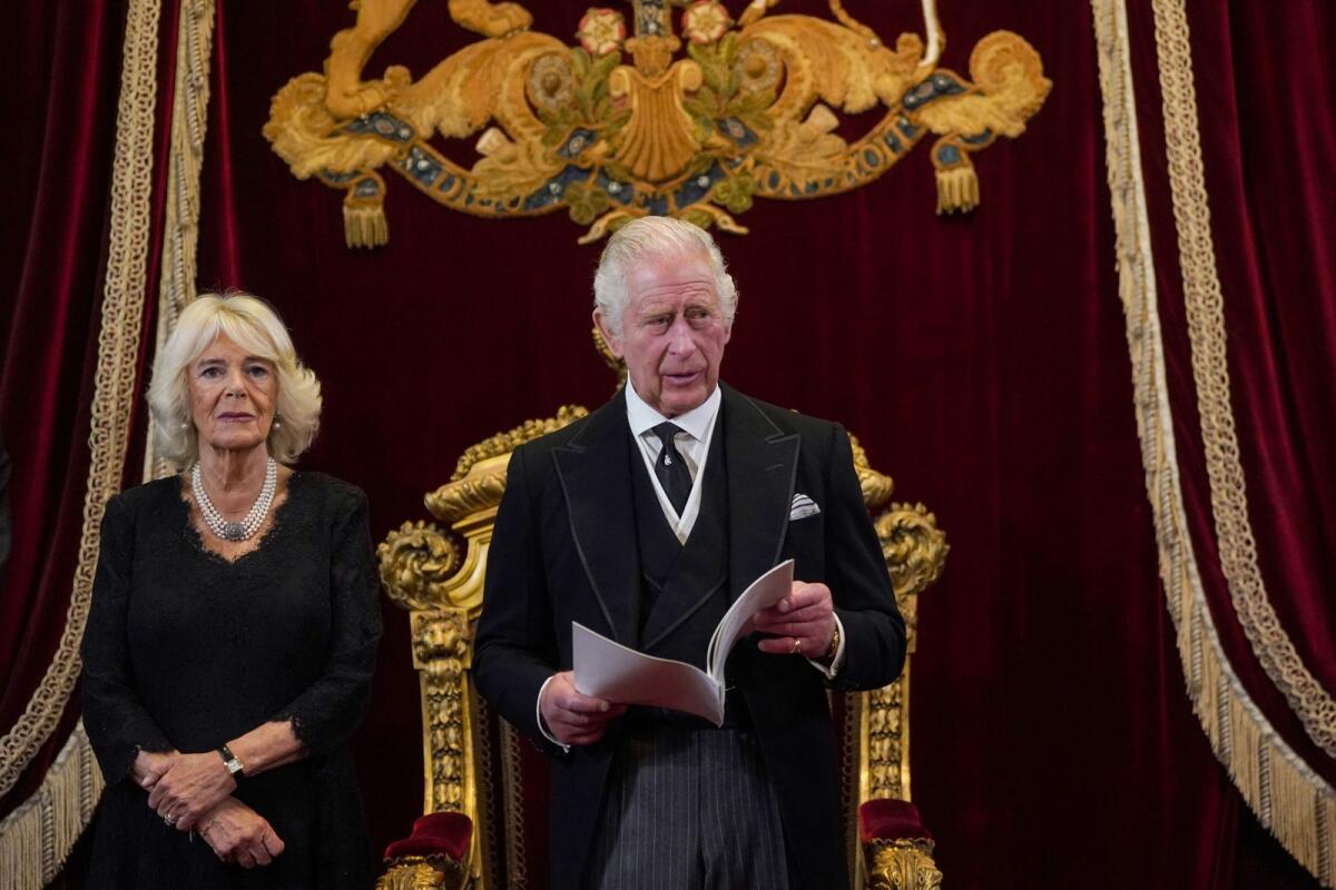 Britain's Camilla, Queen Consort (L) listens as Britain's King Charles III speaks during a meeting of the Accession Council. Photo: AFP