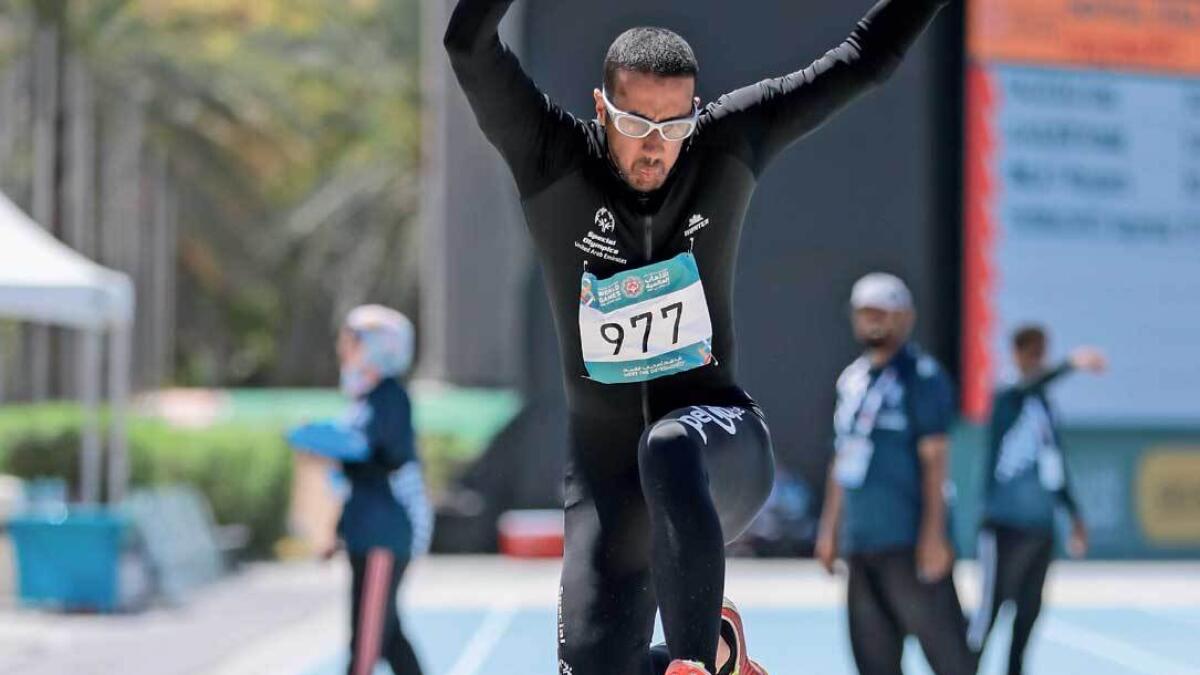 Khalifa Alamiri wins gold medal in long jump in Dubai.