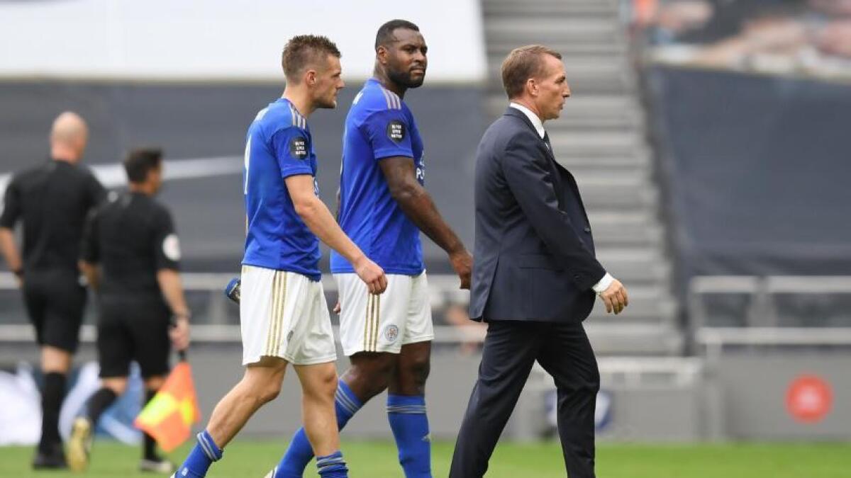 Leicester City manager Brendan Rodgers with Jamie Vardy and Wes Morgan after the match. (Reuters)