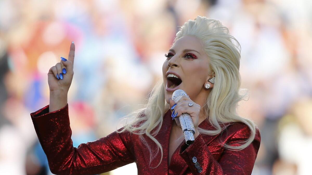 Lady Gaga sings the U.S. National Anthem before the start of the NFL's Super Bowl 50 between the Carolina Panthers and the Denver Broncos in Santa Clara, California February 7, 2016.      REUTERS/Mike Blake