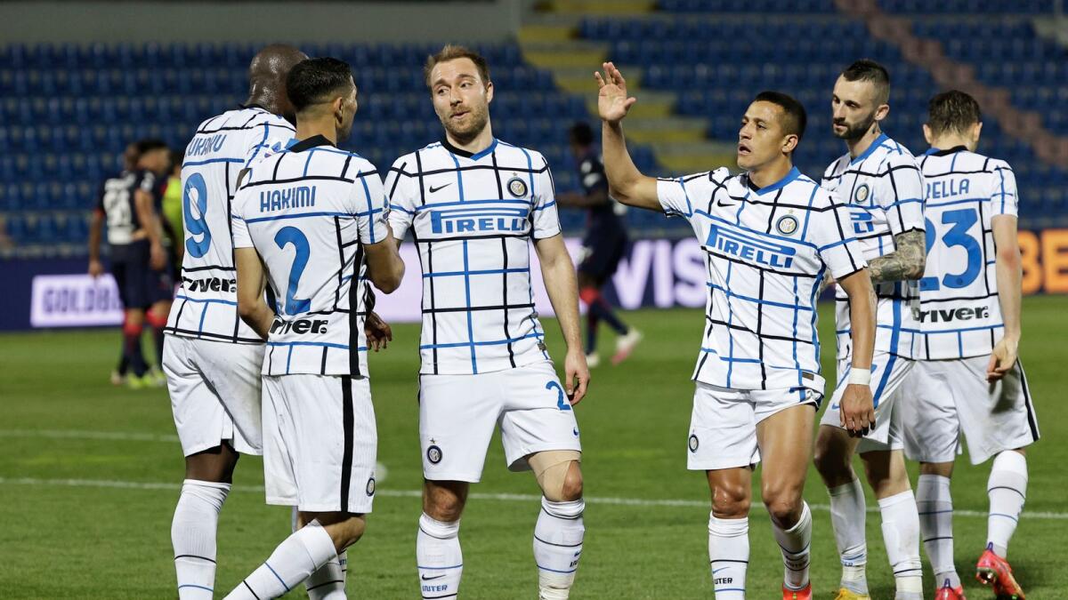 Inter Milan's Achraf Hakimi celebrates a goal with teammates against Crotone. — Reuters