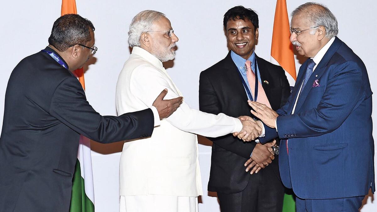 Dr. Ram Buxani meets India Prime Minster Narendra Modi during his visit to UAE in 2015.From left: T.P. Seetharaman, former Ambassador of India to the UAE, Narendra Modi, Anurag Bhushan, former Consul General of India to Dubai, and Dr. Ram Buxani