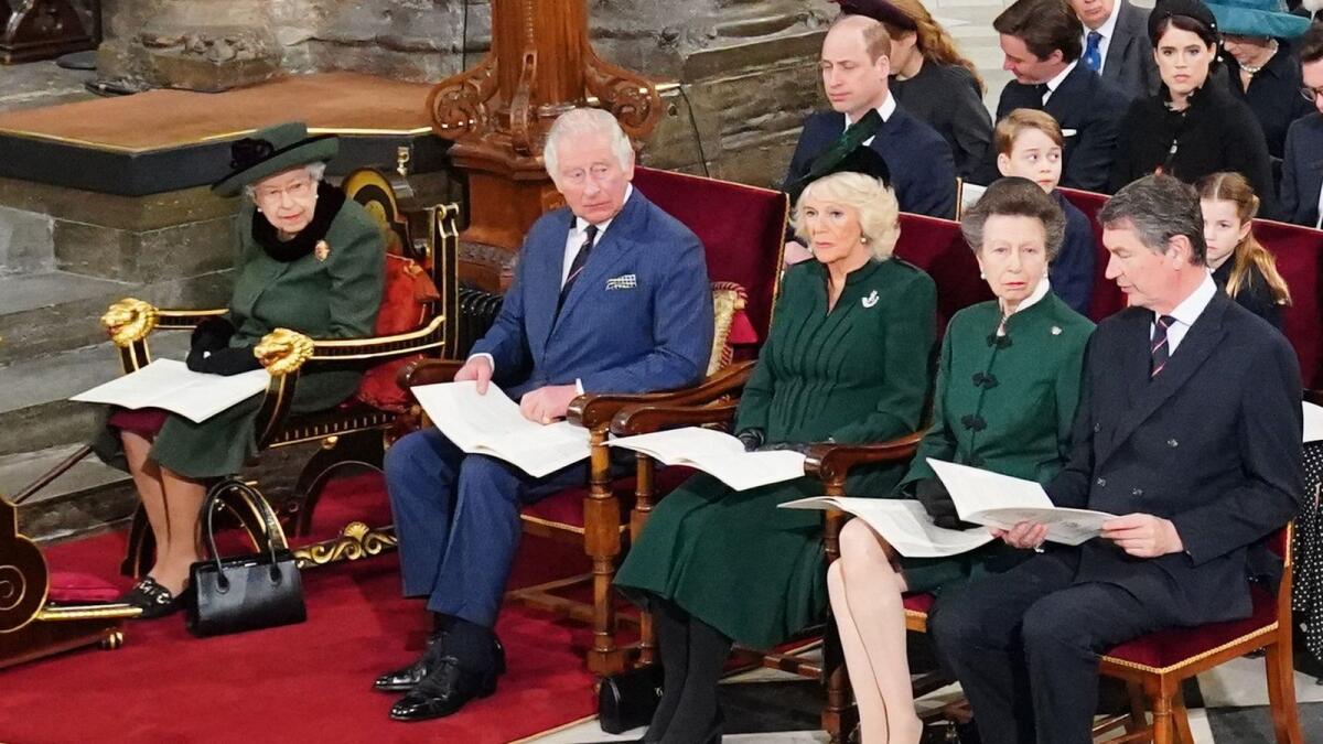 Britain's Queen Elizabeth II (L), and front row (L to R) Britain's Prince Charles, Prince of Wales, Britain's Camilla, Duchess of Cornwall, Britain's Princess Anne, Princess Royal, and Vice Admiral Timothy Laurence, with second row (L to R) Britain's Prince William, Duke of Cambridge, Britain's Prince George of Cambridge and Britain's Princess Charlotte of Cambridge, attend a Service of Thanksgiving for Britain's Prince Philip, Duke of Edinburgh, at Westminster Abbey in central London on March 29, 2022. Photo:  AFP