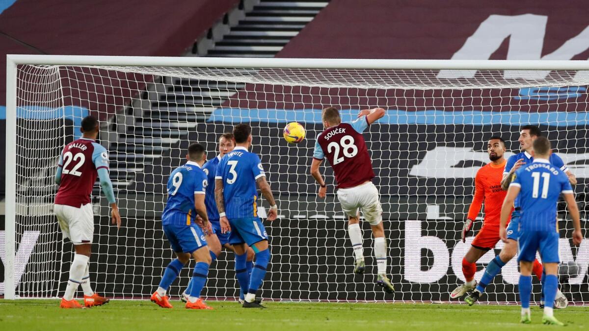 West Ham's Tomas Soucek (centre) scores a goal agianst Brighton during the English Premier League match. — AP