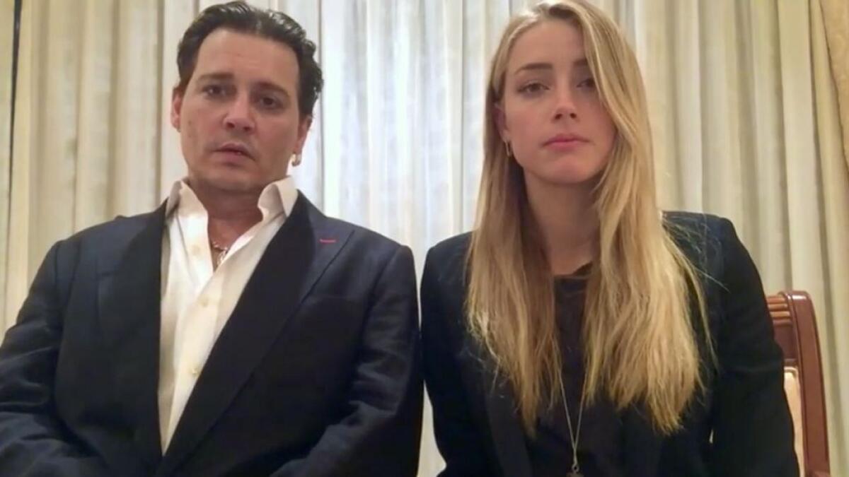 Johnny Depp and Amber Heard spoke in a videotaped apology after pleading guilty to providing a false immigration document amid allegations when Heard smuggled the couple's dogs to Australia.