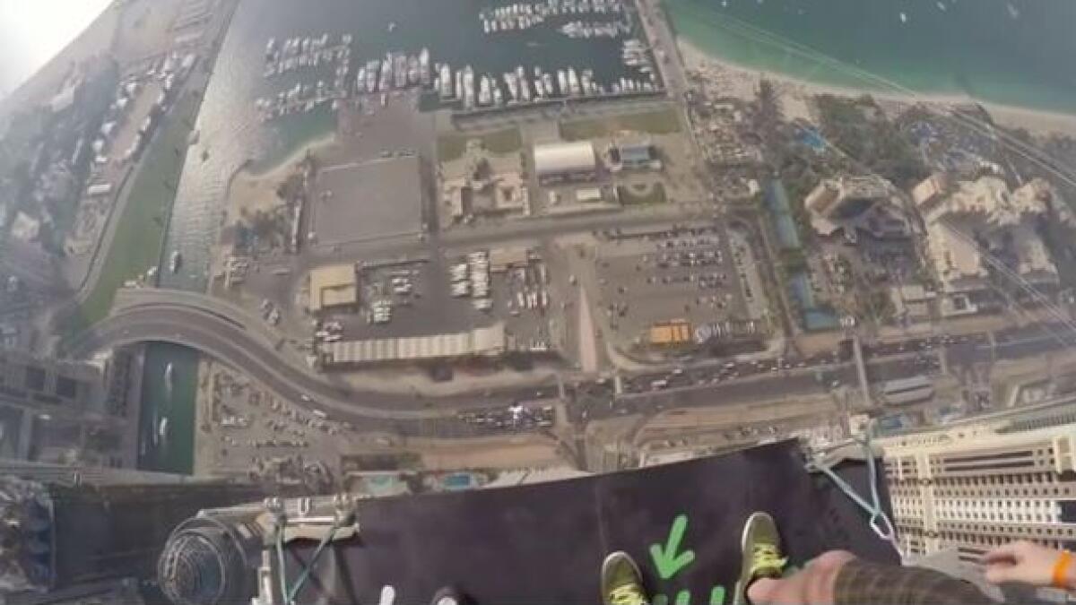 Video: Three friends jump off Dubai skyscraper