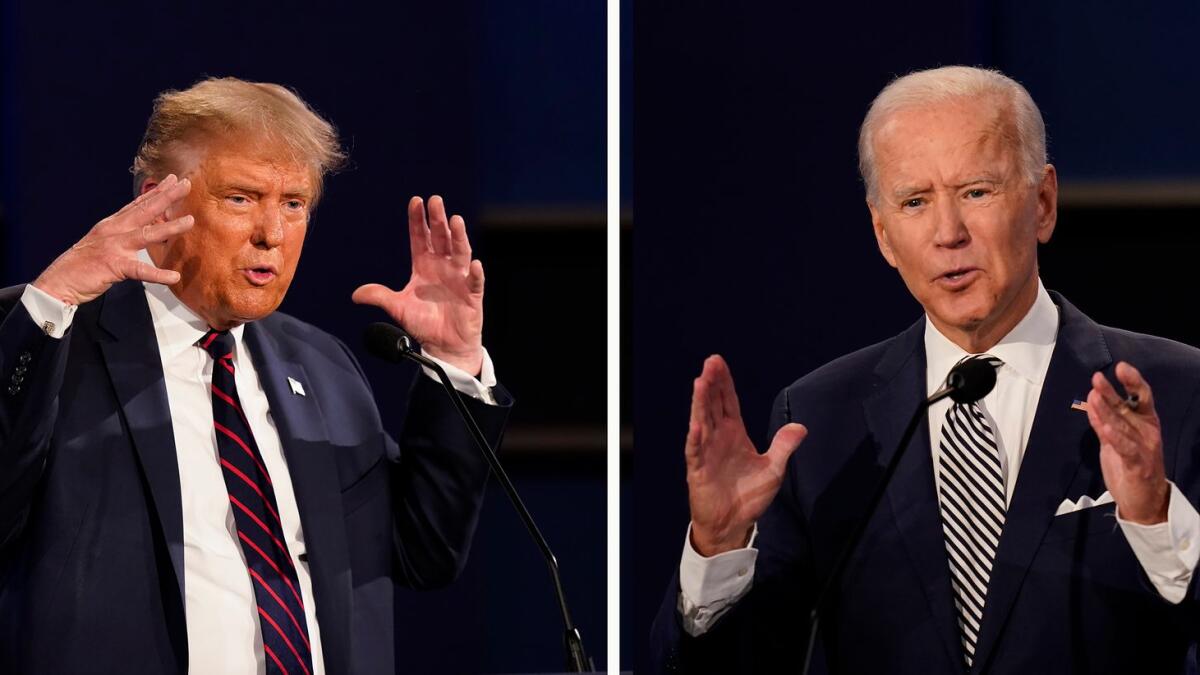 This file photos show Donald Trump and former Joe Biden during the first presidential debate at Case Western University and Cleveland Clinic, in Cleveland, Ohio. AP