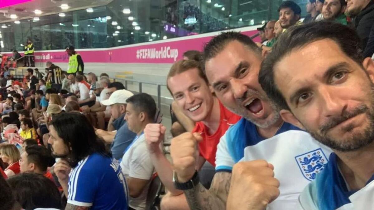 Paul with his friends inside the stadium in Qatar. — Supplied photo