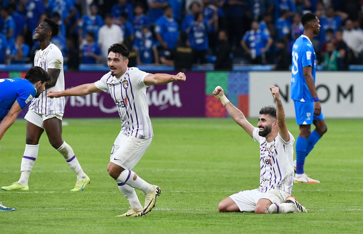 Al Ain's Matias Palacios and Yahia Nader celebrate after the win over Al Hial. — Reuters