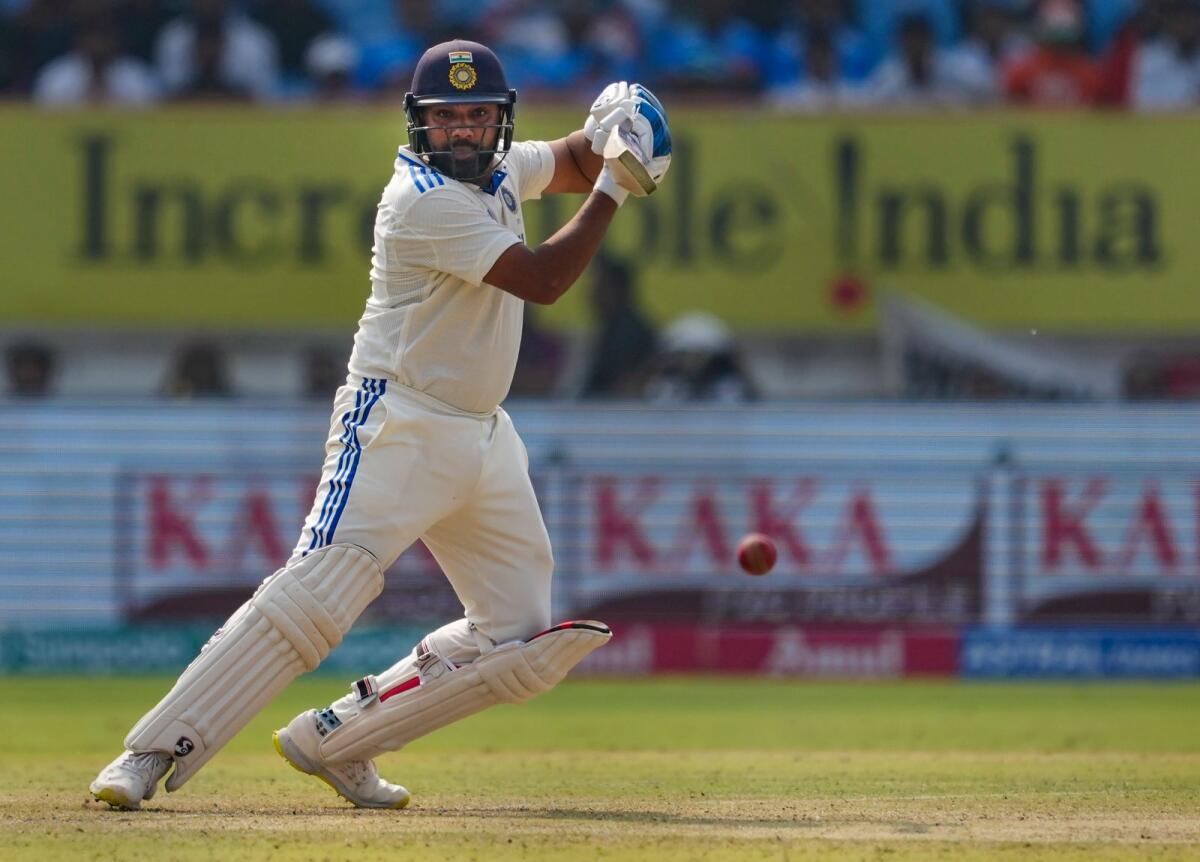 Rohit Sharma survived a dropped catch to compile a century. - AFP
