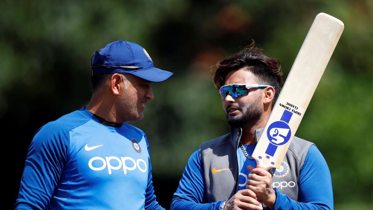 Rishabh Pant (right) with MS Dhoni. (Reuters)