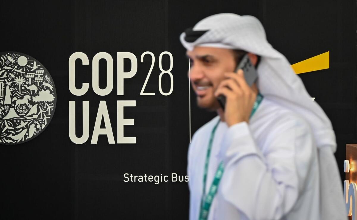 A visitor at the UAE-hosted COP28. Photo by M Sajjad