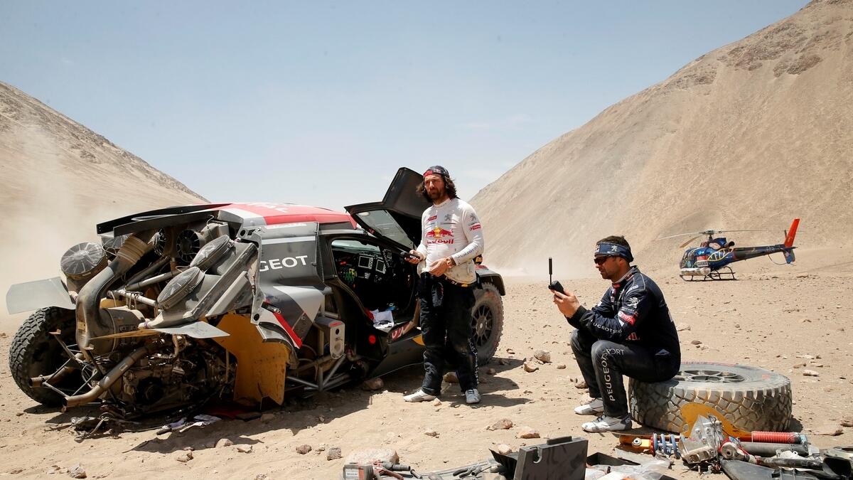 Loeb out of Dakar as Peterhansel forges on