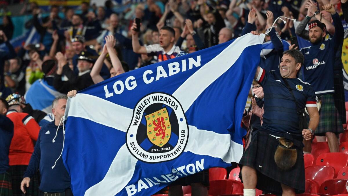 Scotland fans react after their team's Euro Group D match against England  at Wembley Stadium in London on June 18. (AFP)