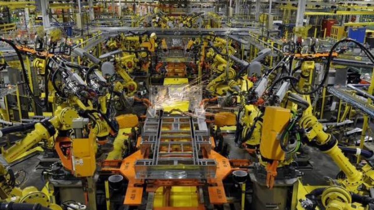 Industrial robots assembling in manufacturing processes could boost high standards of precision. 