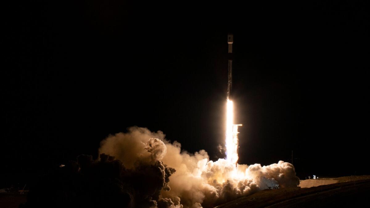A SpaceX rocket carrying the Surface Water and Ocean Topography satellite lifts off from Vandenberg Space Force Base in California on Friday. — AP