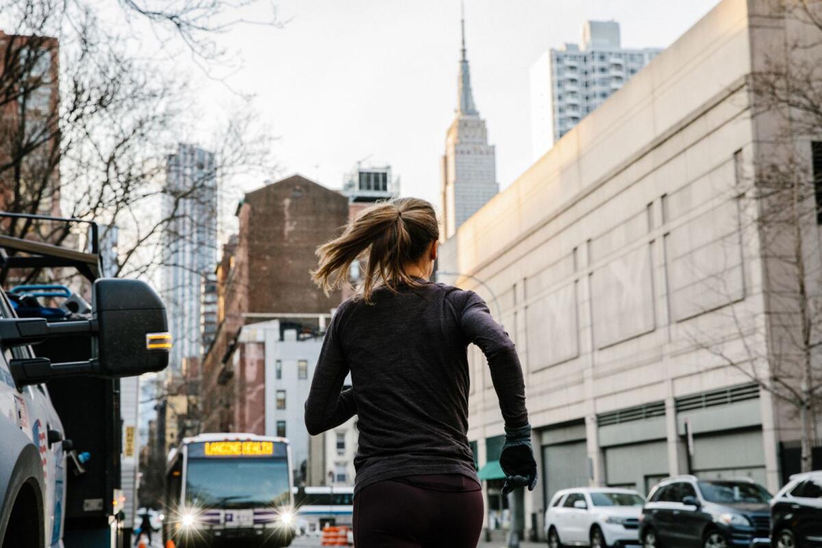 A woman runs in New York in February 2020.  — Laurel Golio/The New York Times