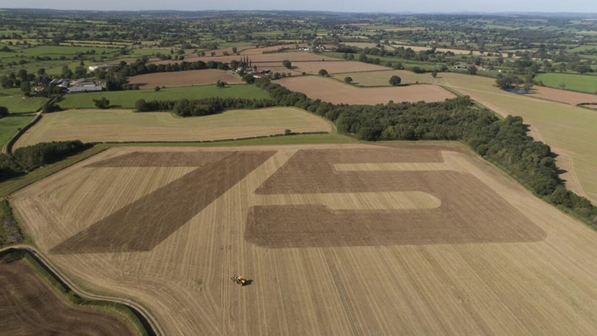 CLEAR MESSAGE: JCB’s ‘75’ artwork, which is visible from space,  at a combined field in Staffordshire in the United Kingdom