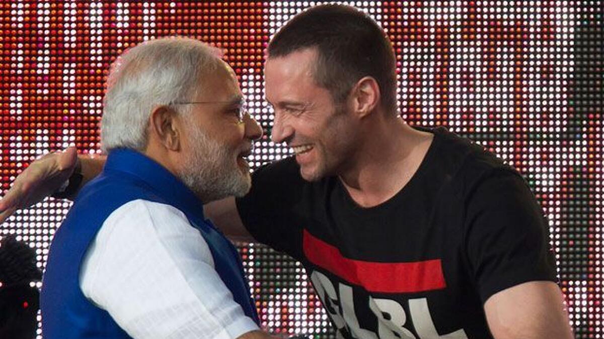 Indian PM Narendra Modi hugs actor Hugh Jackman on stage during the Global Citizen Festival concert in Central Park, New York.