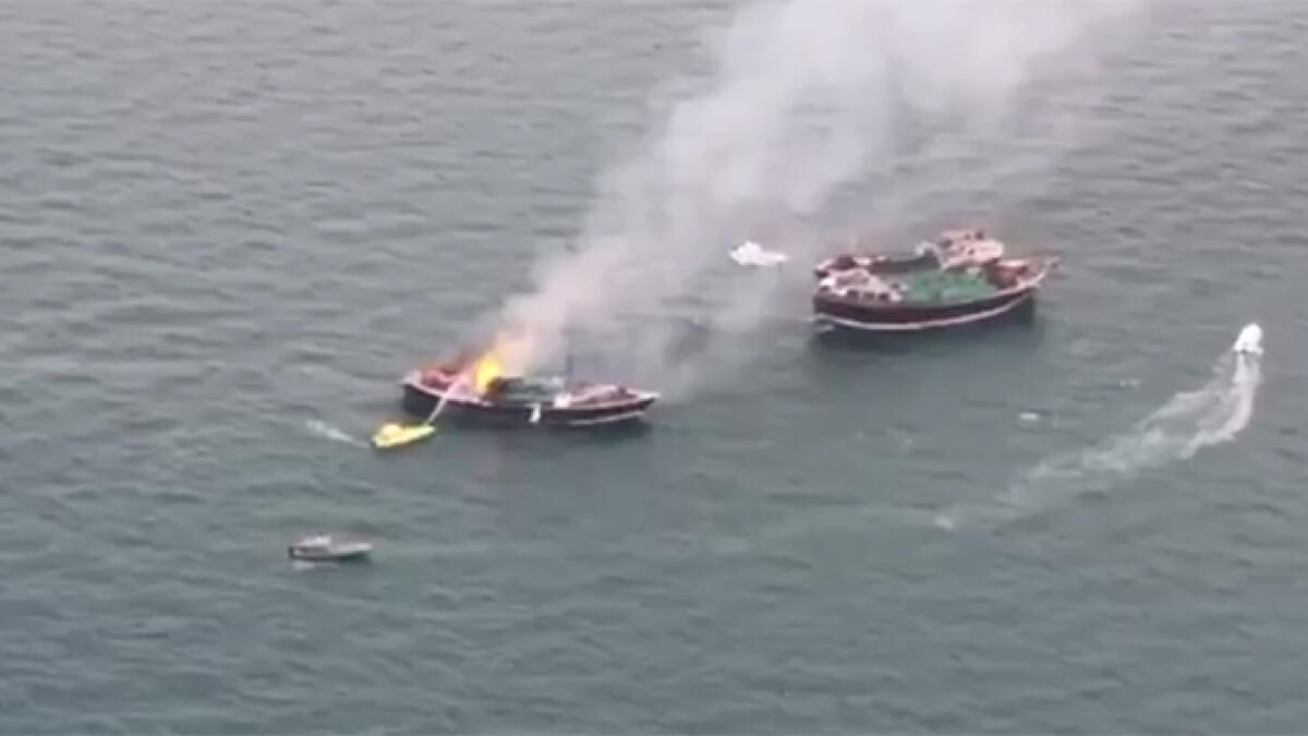 Watch: Dubai Police put out boat fire near floating bridge