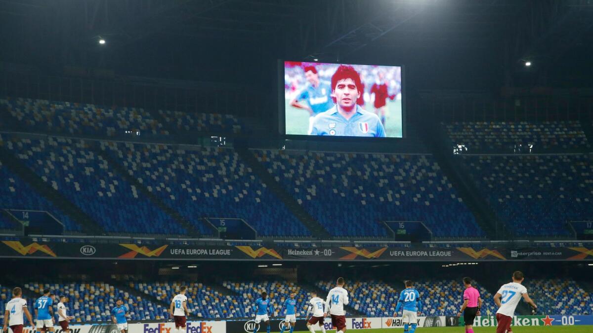 An image of Diego Maradona is displayed on the big screen during the match.